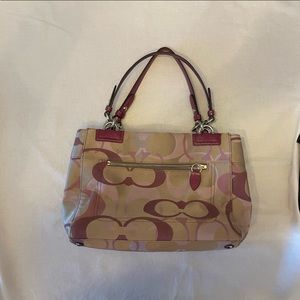 Coach Authentic Penelope tan, pink and purple purse with keychain.
